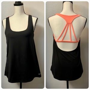 Strappy and open back tank top with built in bra